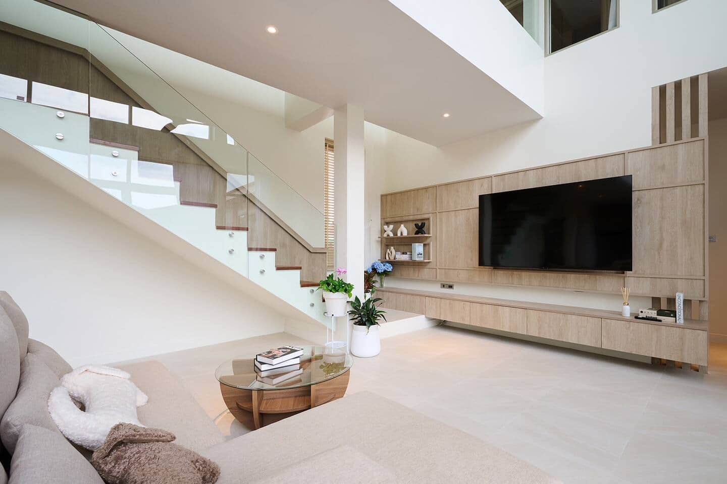 Living room and staircase at Villa Belcasa